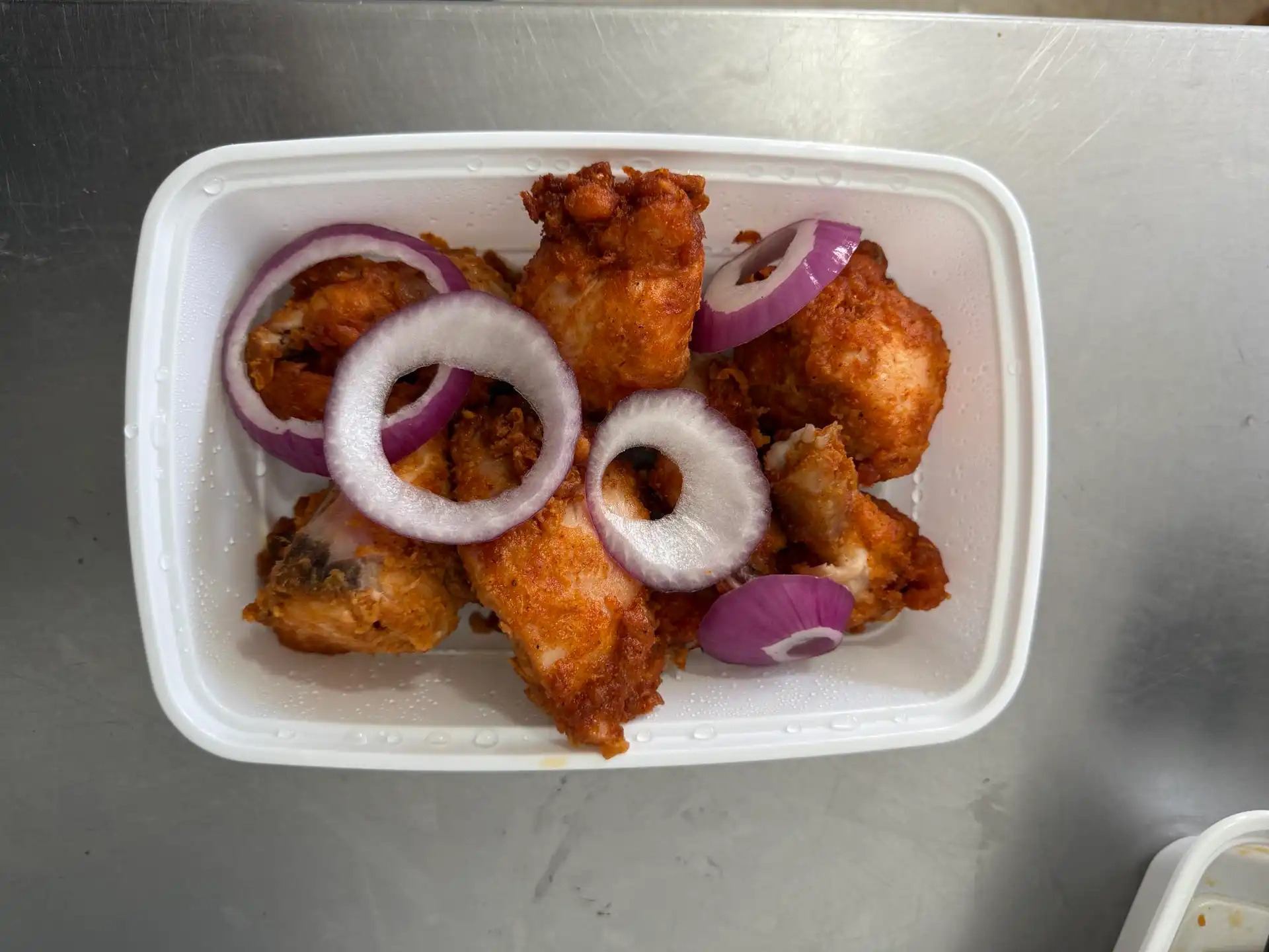 Chili Chicken at Chennai Biryani House - Crispy chicken tossed in a spicy Indo-Chinese sauce with peppers